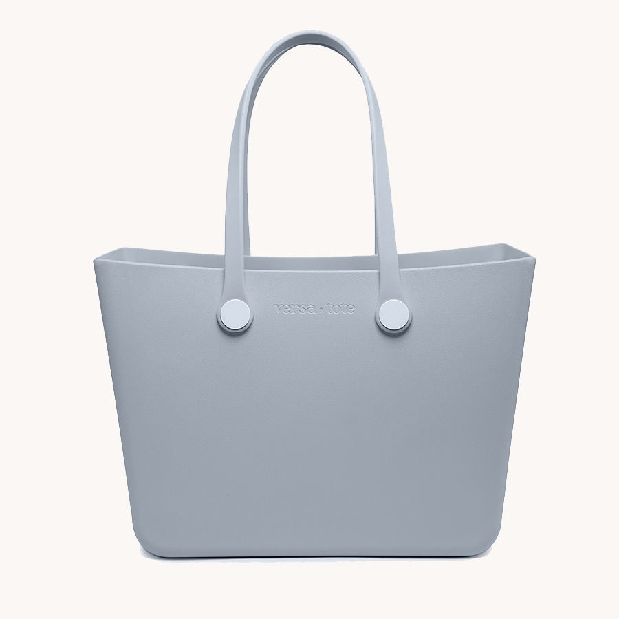 Carrie All Tote in light blue, square shape with tall handles and snap-button hardware
