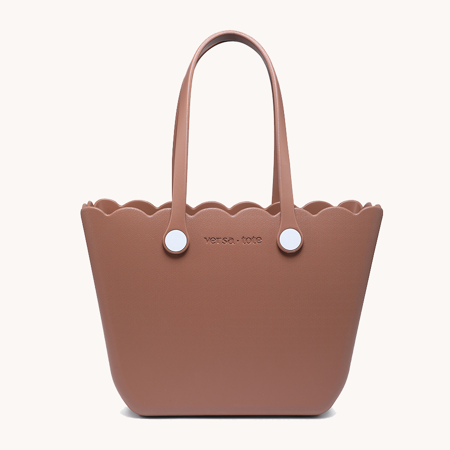 Scalloped tote in dusty rose-brown with two round snap buttons and top handles