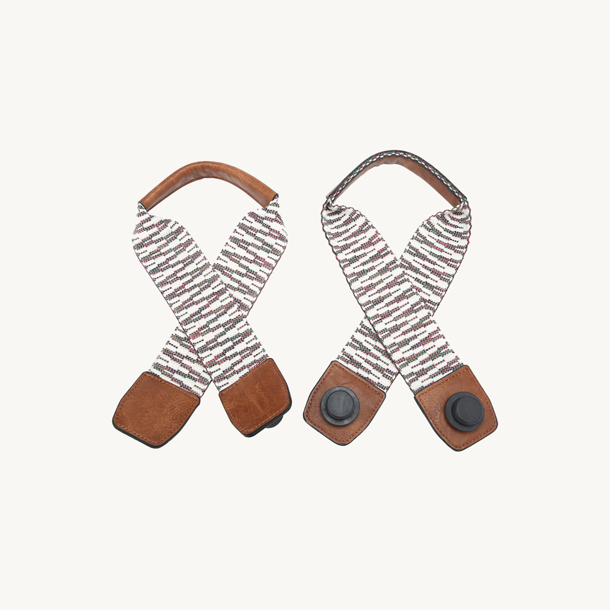 Aztec Versa strap pair: burgundy striped and black-and-white diamond, leather end tabs.