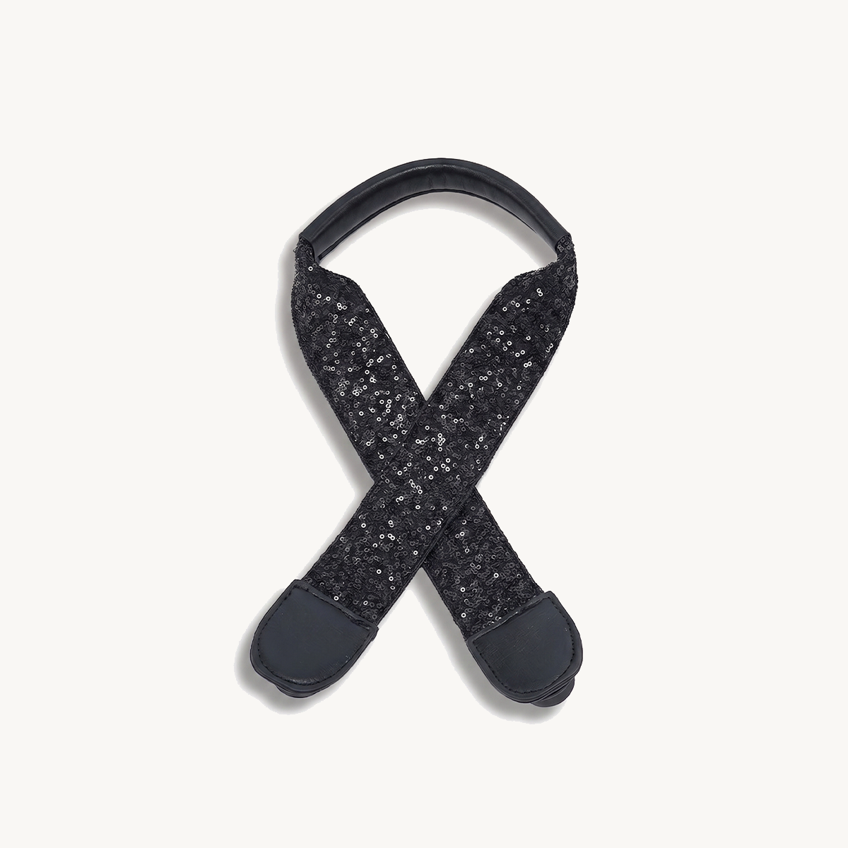 Sequin guitar strap for Versa in black with sparkly crossover straps and round padded ends.