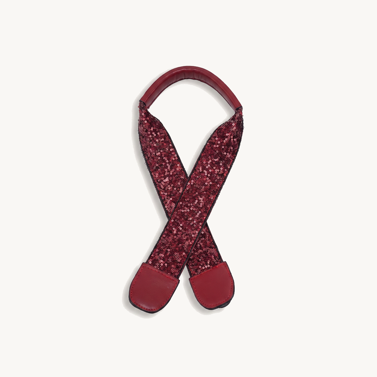 Sequin guitar strap for Versa in red with glitter cross straps and red padded ends.