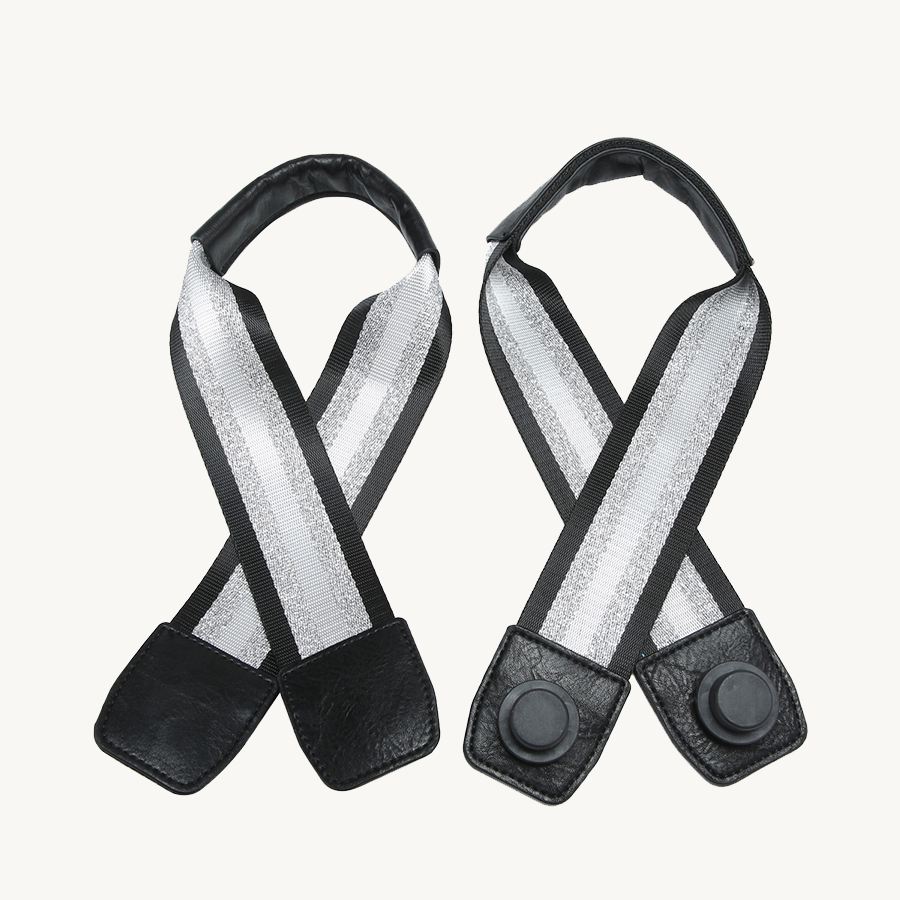 Striped guitar strap pair view: black/silver-white and khaki/gold-beige with leather tabs